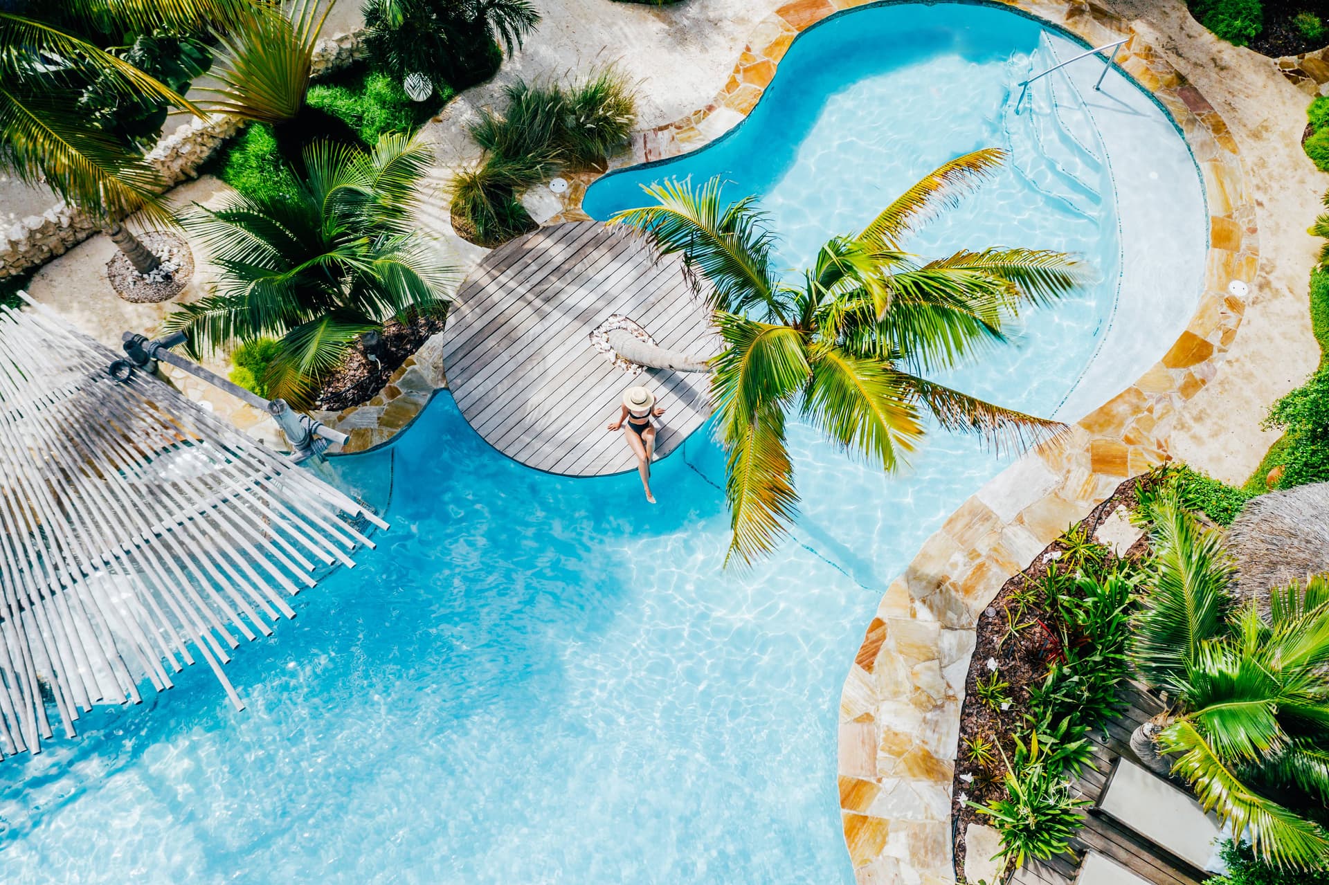 Tropical pool and casitas at Boardwalk Boutique Hotel Aruba, official photography
